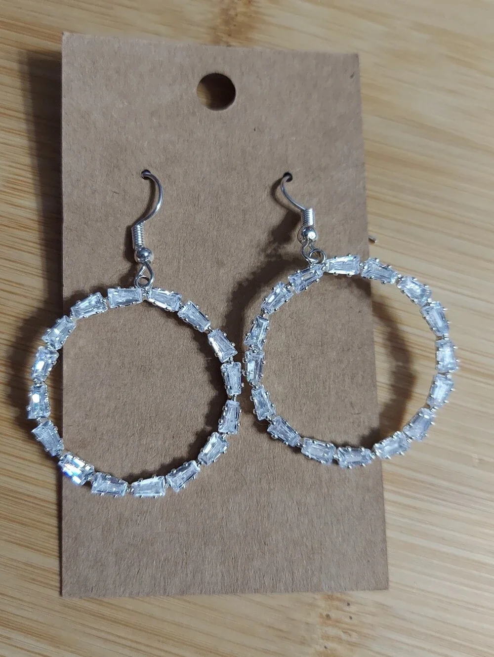 Polished Silver Tone/Faceted Cut Crystal (East-West) Design Hoop Earrings